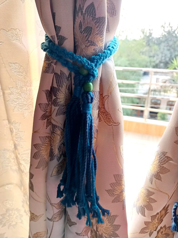 medani blue curtain holder